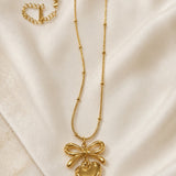 Gold Bow &amp; Heart Locket Necklace
